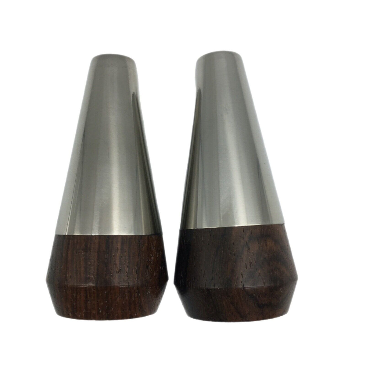 A pair of vintage Danish wood and stainless salt & pepper shakers with plastic stoppers, measuring 3 inches in height.
